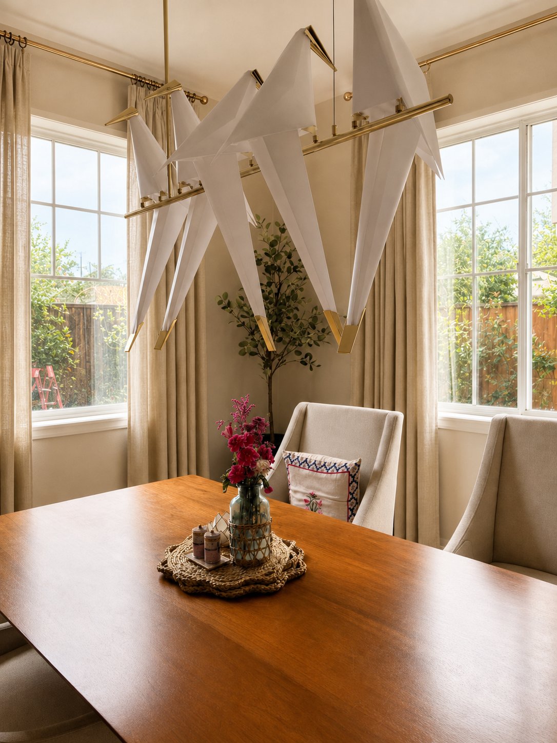 Open Storey dining interior — dining room with perch light